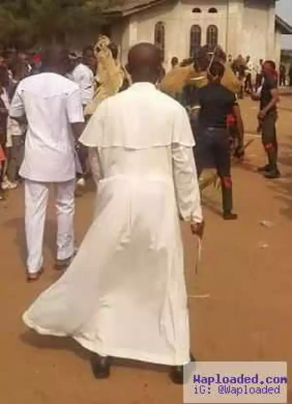 Photos: Is there anything wrong with a Catholic priest dancing with a masquerade?